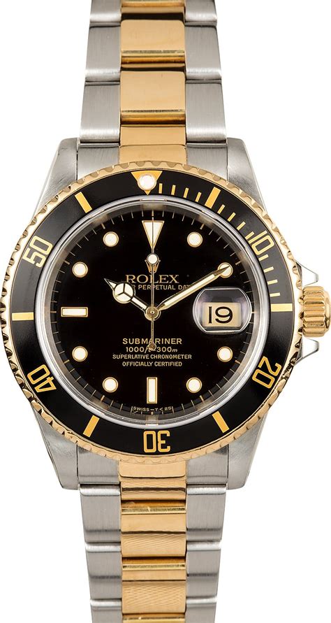 rolex black and gold submariner